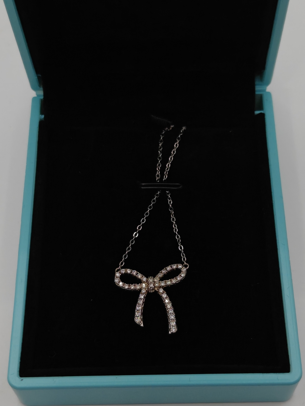 Sterling Silver Moissanite Bow Shape Necklace - Picture 6 of 6